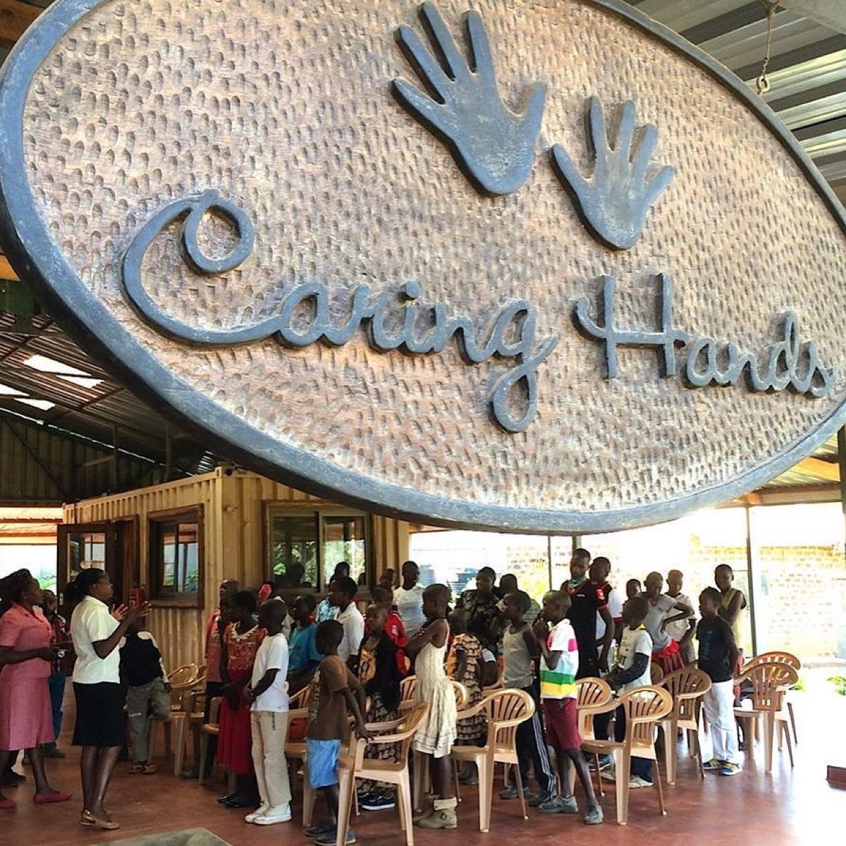 Caring Hands Uganda community gathering